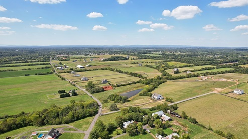 Aerial photos of the community shows large plots of lands