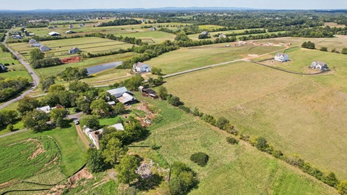 Aerial photos of the community shows large plots of lands