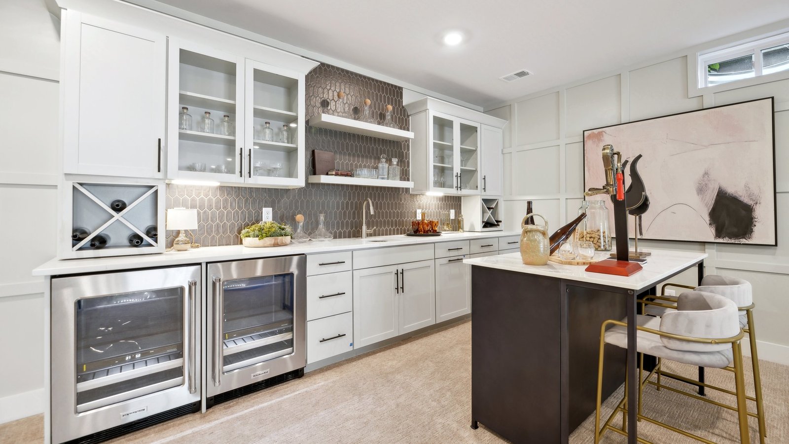 The basement area features 2 large wine coolers and a bar