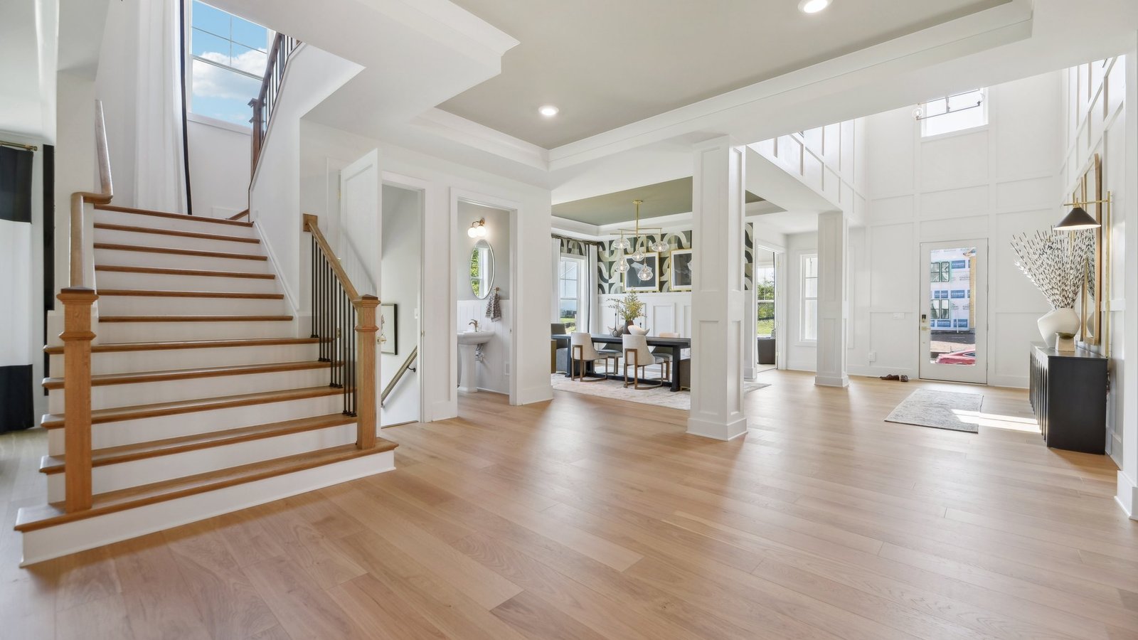 Past the foyer to the right is a large staircase