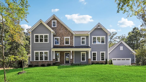Estate home for sale with beautiful blue siding