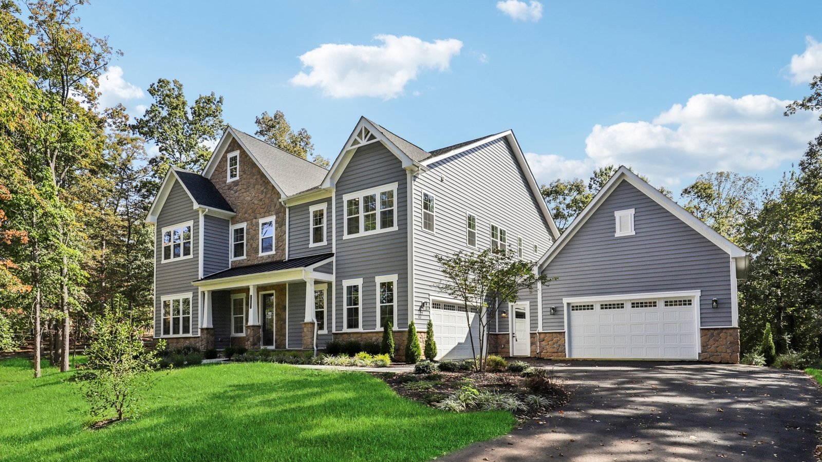 Estate home for sale with beautiful blue siding