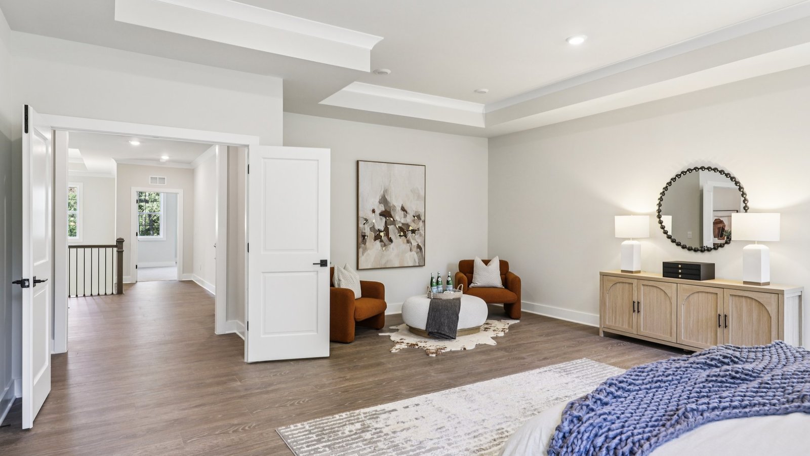 double doors open into the primary bedroom