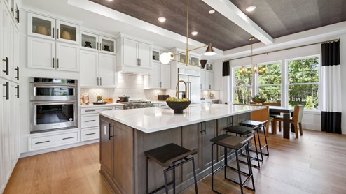 kitchen has an abundance of cabinets to store everything you need