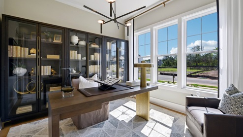 The flex room immediately to the right of the entrance is perfect for an office set-up