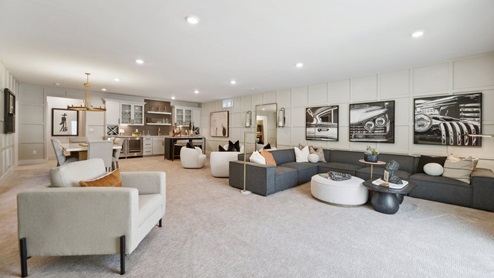 multiple lounging options in the basement rec room