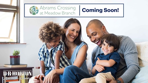 Family sitting on a couch
