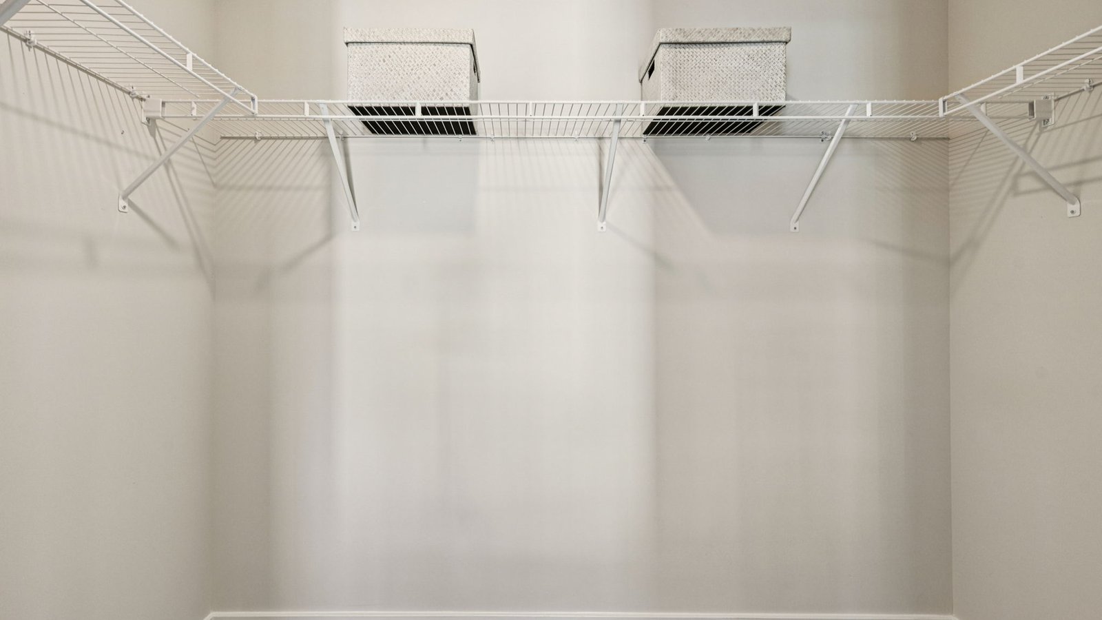 walk in closet in primary bedroom