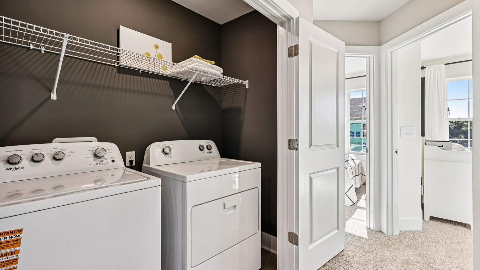 laundry room with storage space