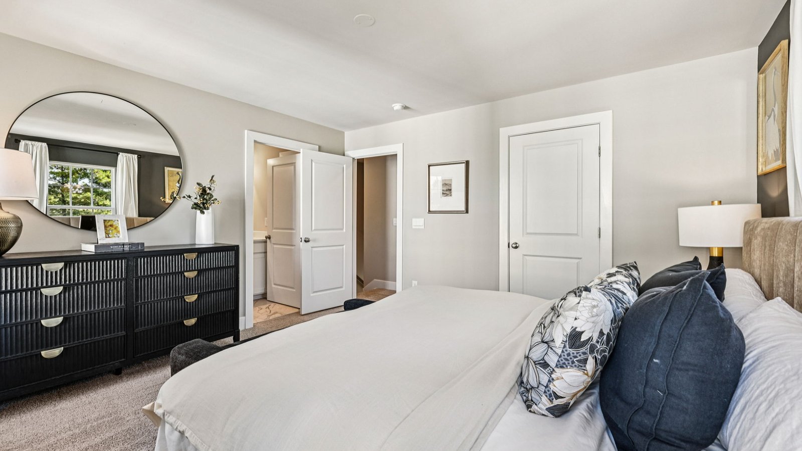 primary bedroom with open concept and modern design