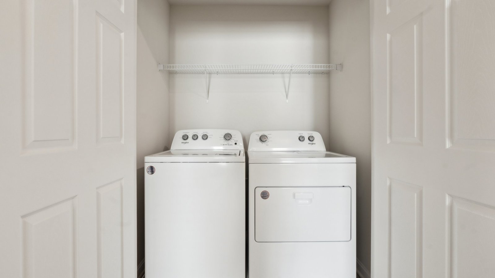 laundry room with storage