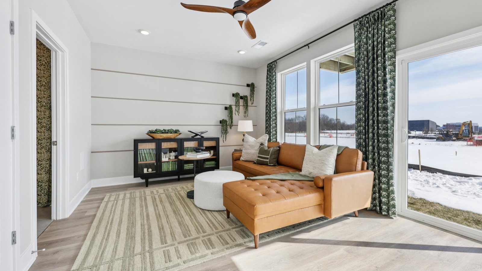 open concept rec room in basement