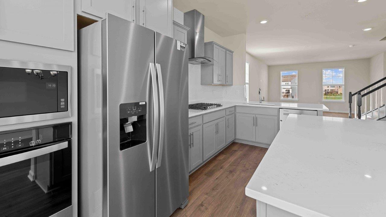 Stainless steel appliances and island