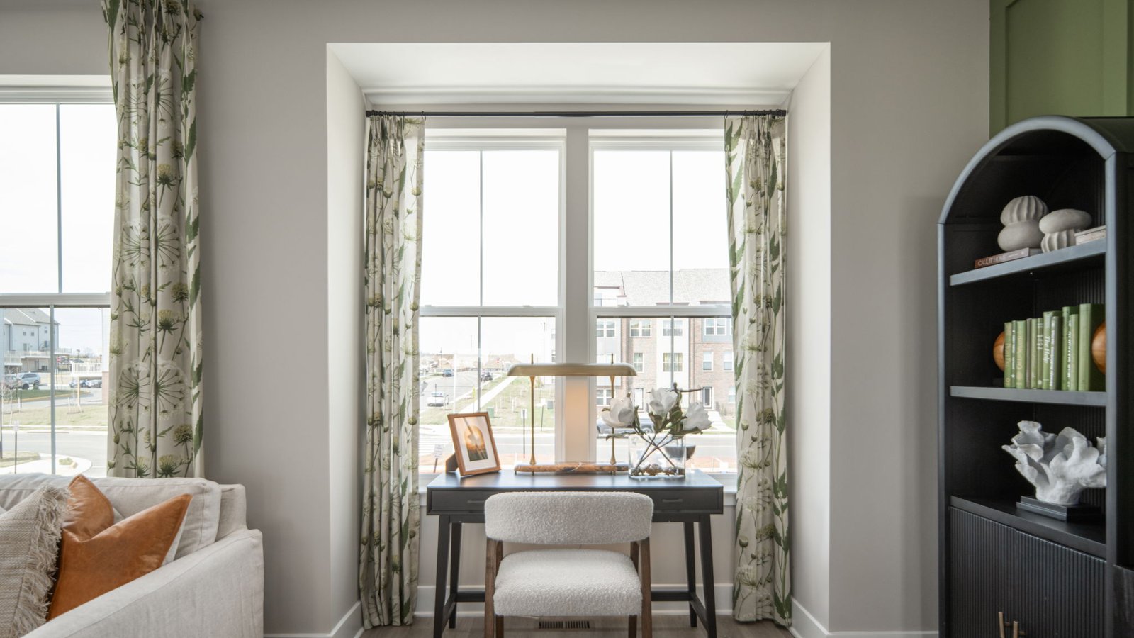 modern living area with space for an office desk