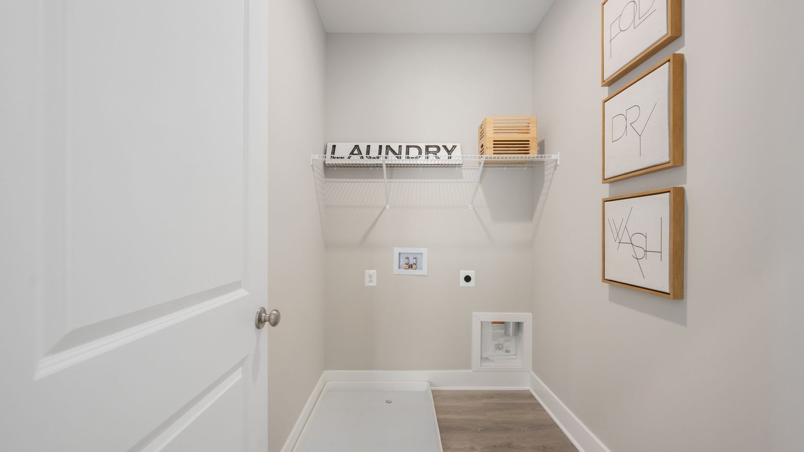 laundry room with storage
