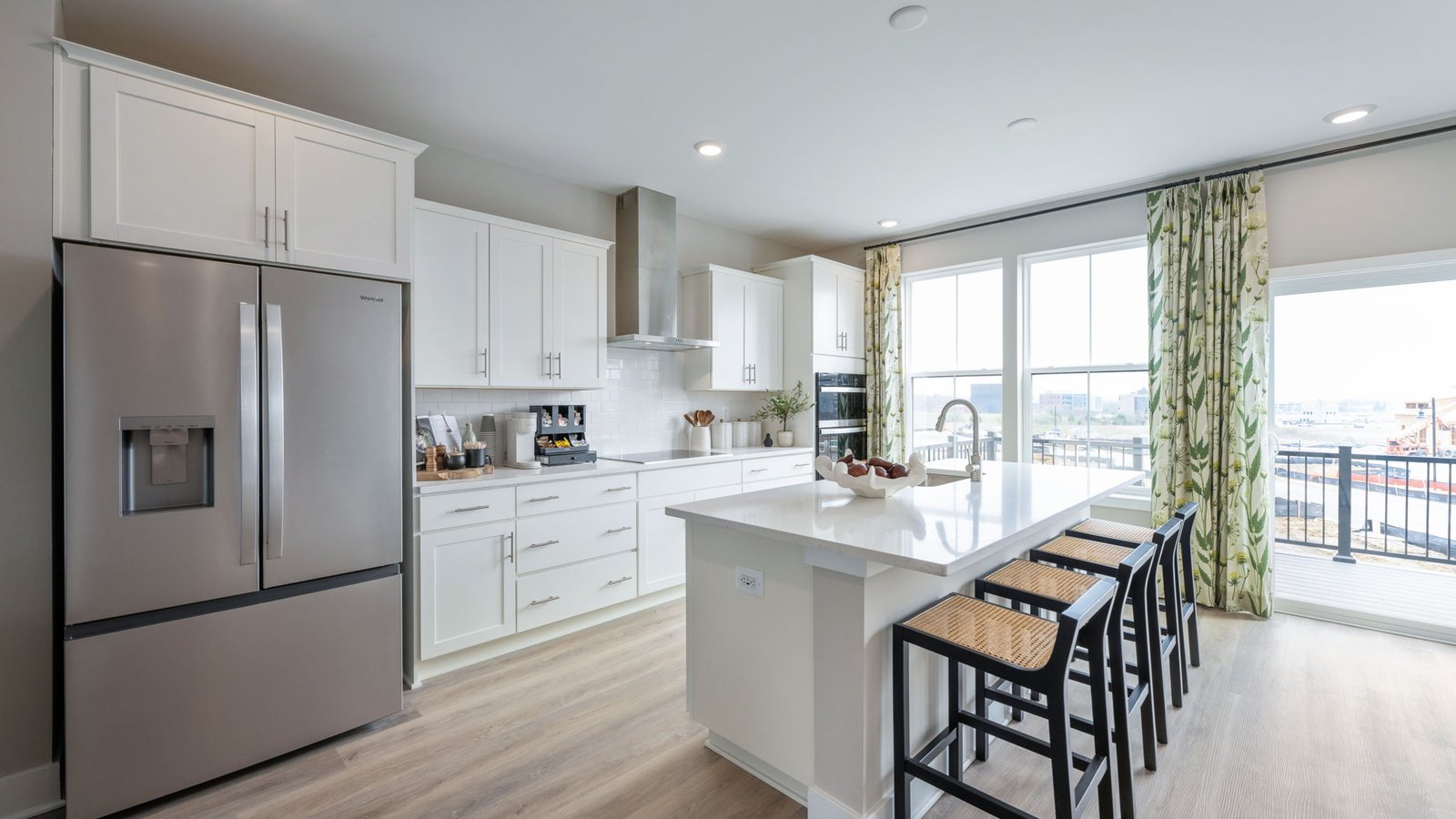 Gourmet kitchen with center island in Innovation Town Center townhome