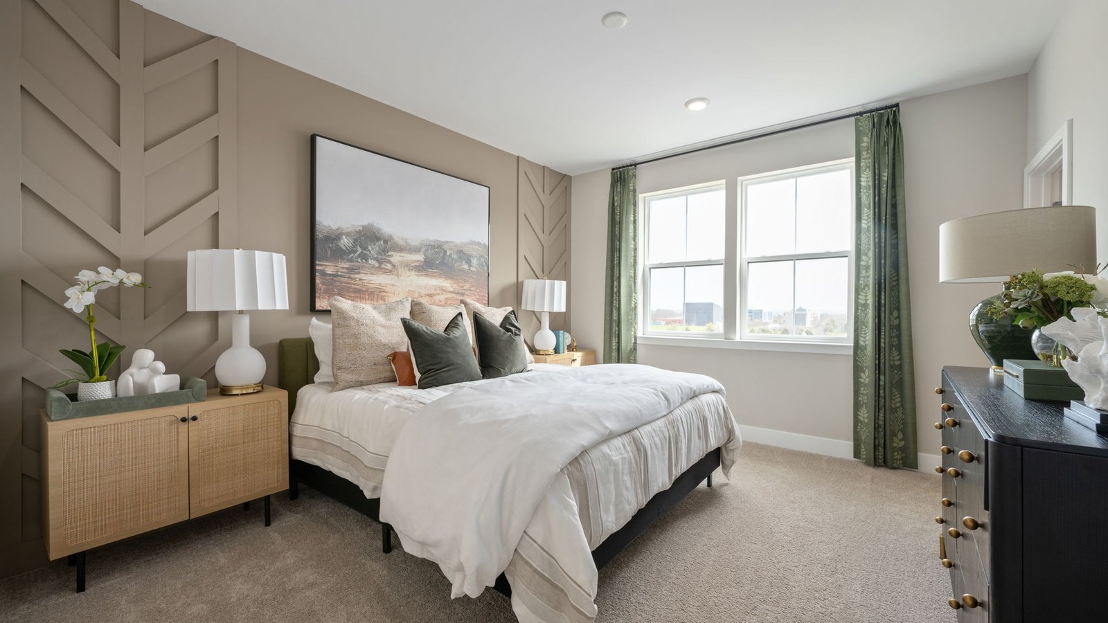 Spacious primary bedroom in new construction townhome