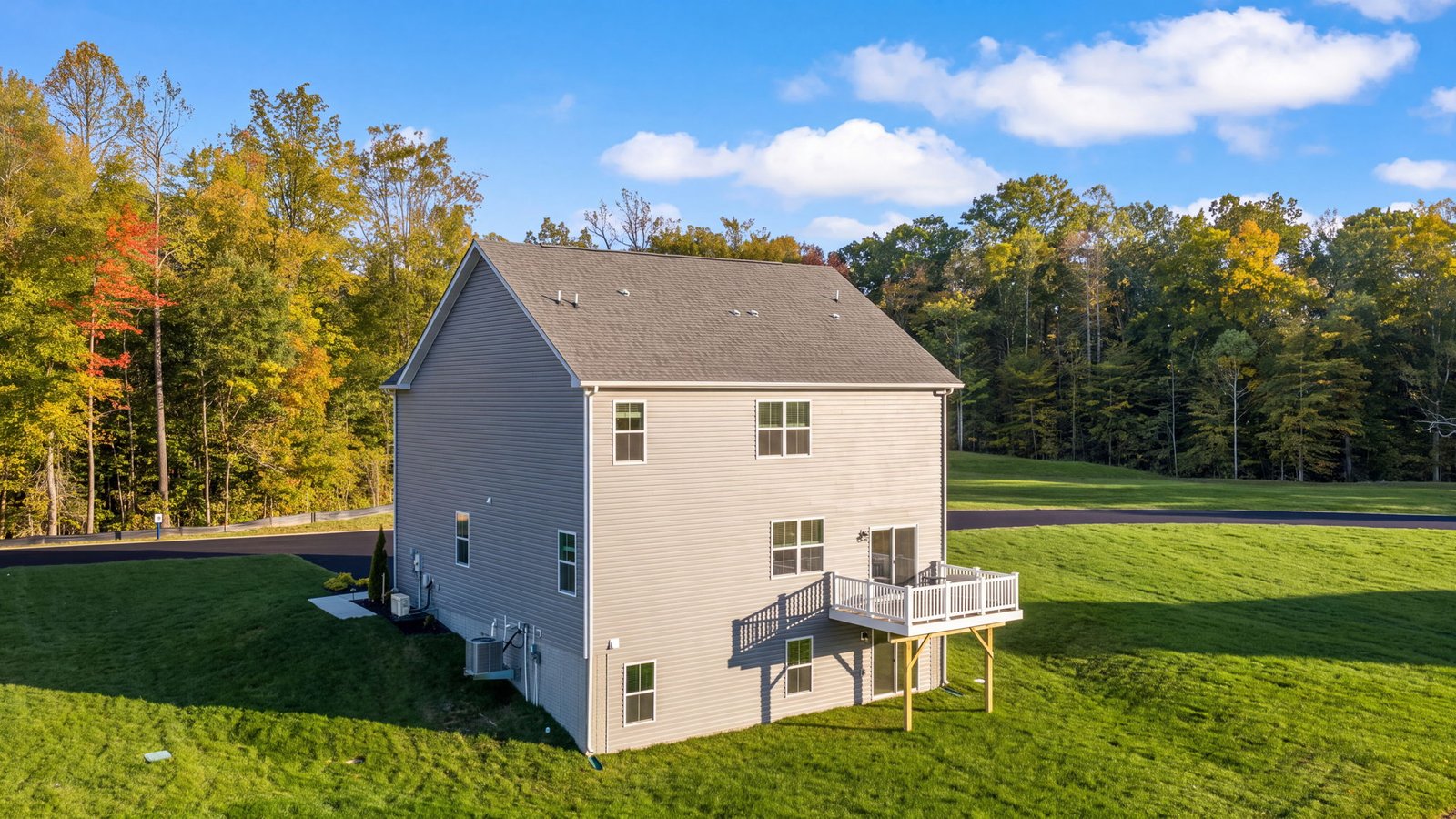 Expansive backyard on an acre homesite at a new single-family home in King George, Virginia.