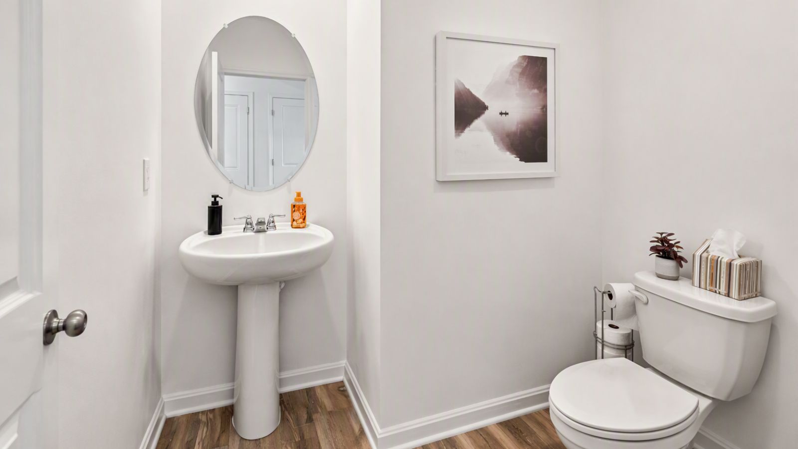 Half bathroom with modern fixtures and finishes in a new construction home in King George VA