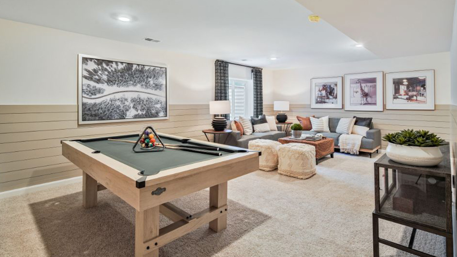 basement with living room and game room