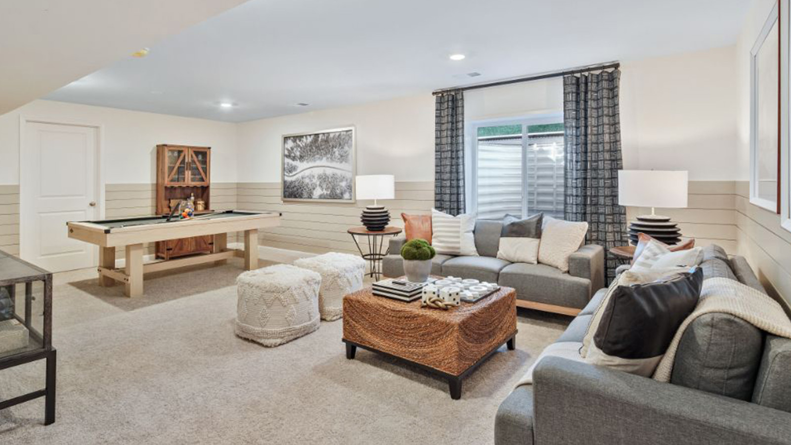 basement with living room and game room