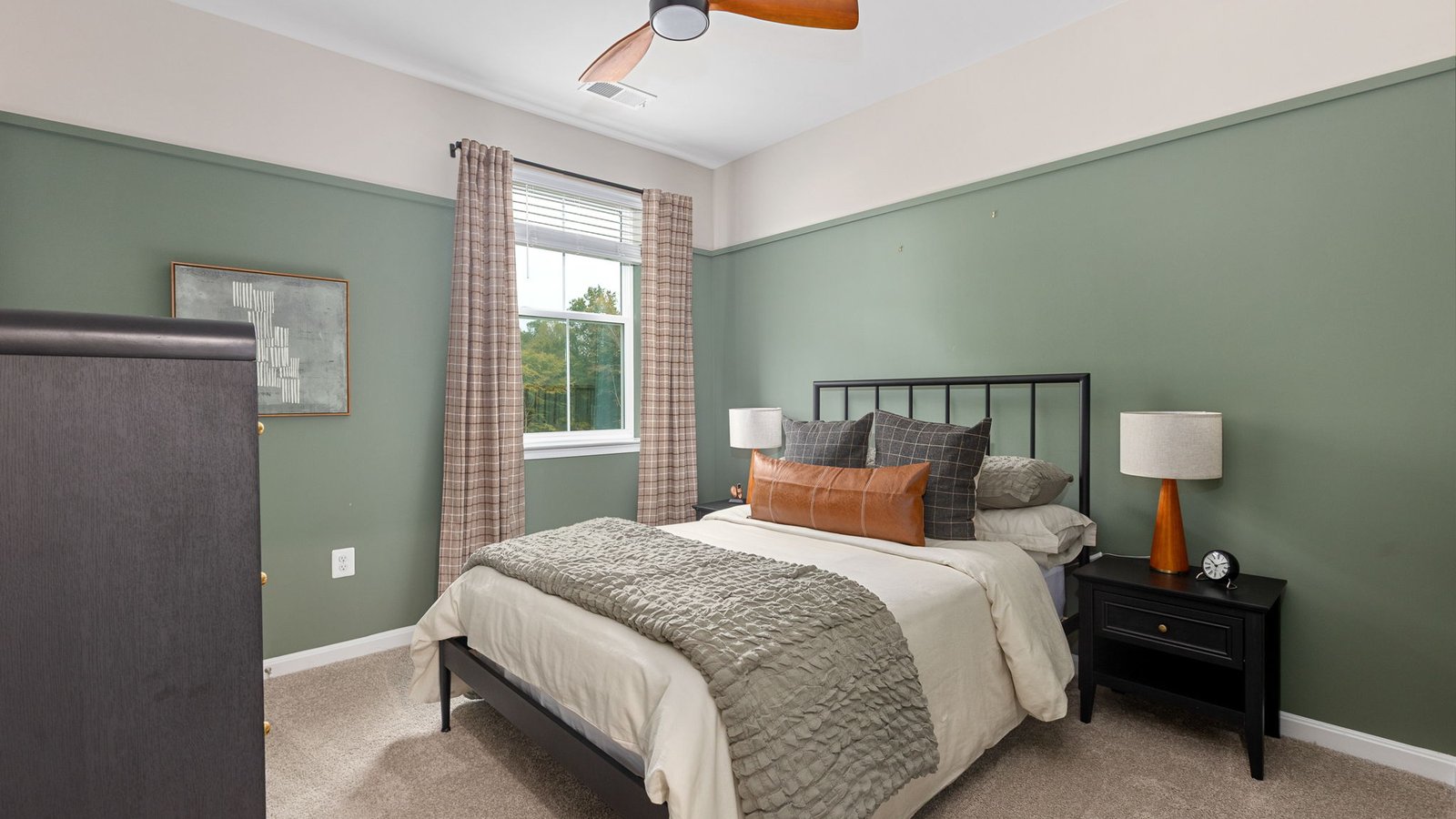 Comfortable secondary bedroom in a new construction home in King George, Virginia.