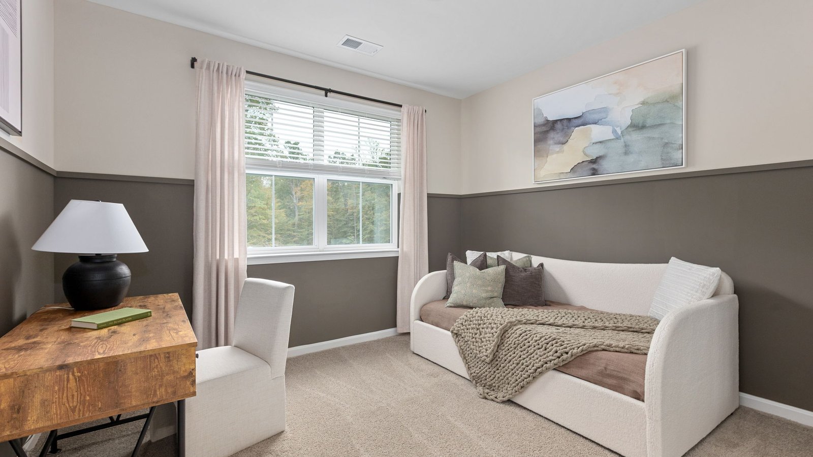 Comfortable secondary bedroom in a new construction home in King George, Virginia.