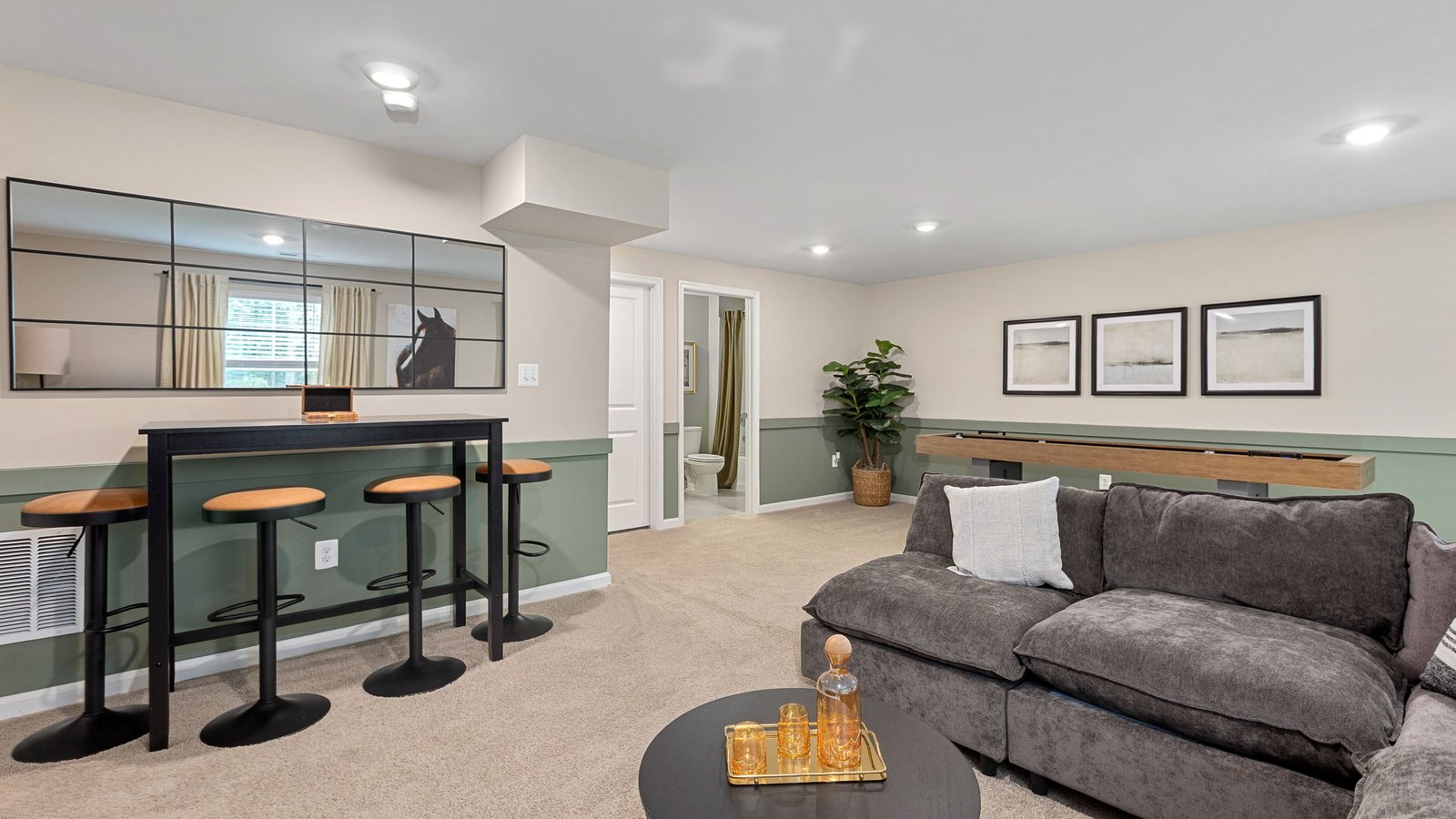 Finished lower-level living space in a new single-family home in King George, VA.