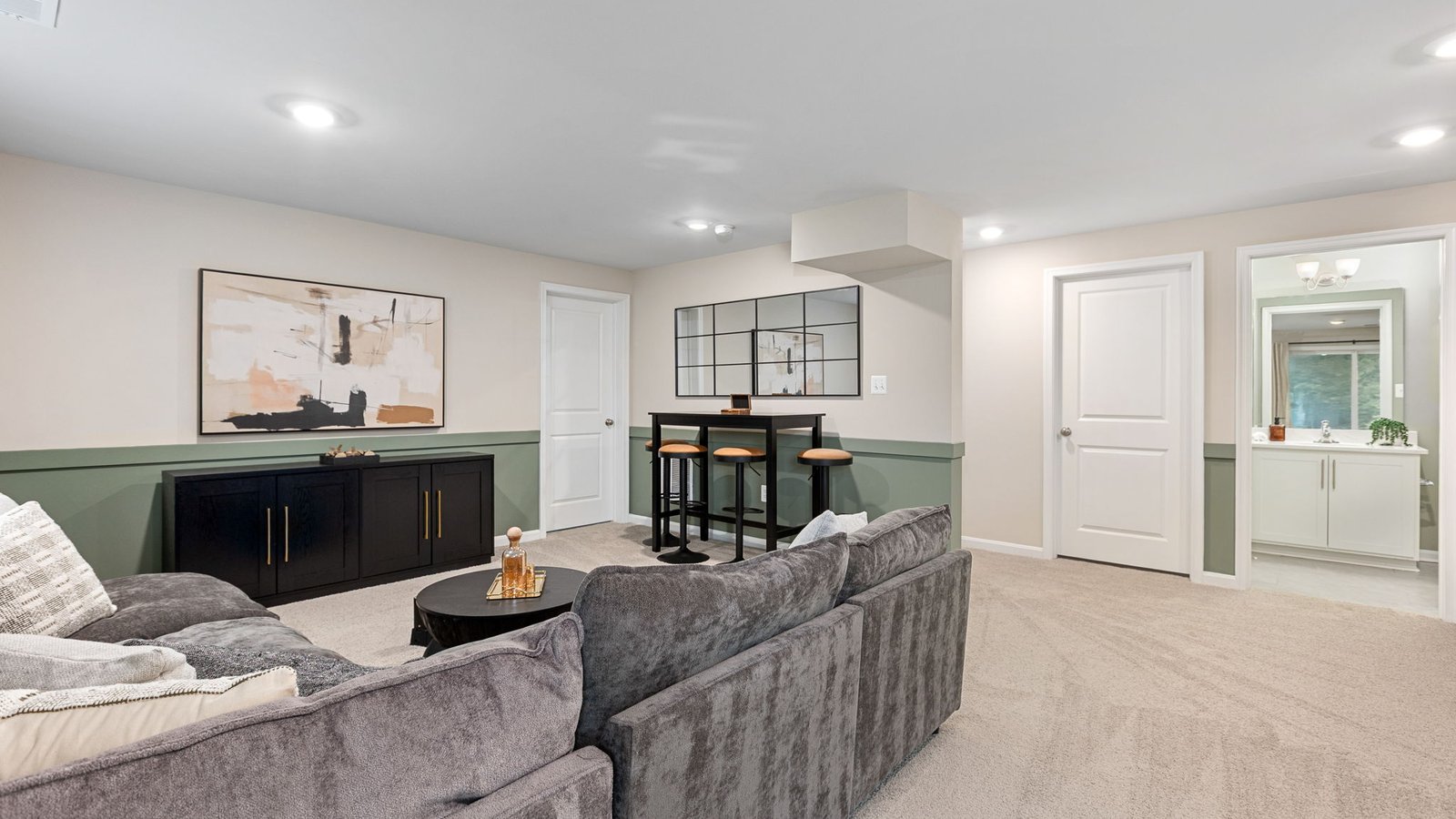 Finished lower-level living space in a new single-family home in King George, VA.