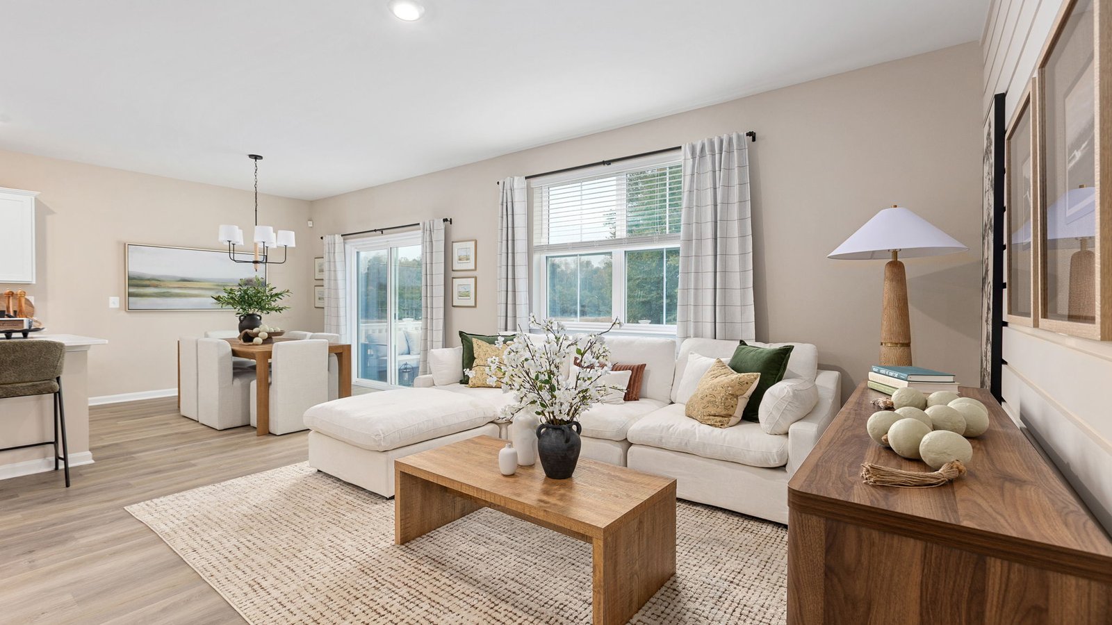 Open-concept kitchen and living area inside a new single-family home in King George, Virginia.