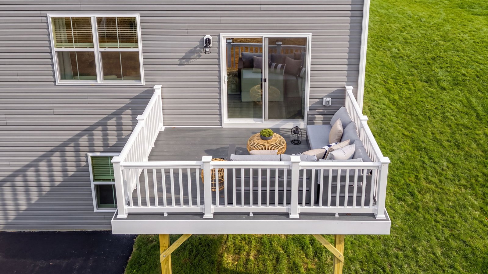 Outdoor living area overlooking a spacious homesite at a new single-family home in King George, VA.