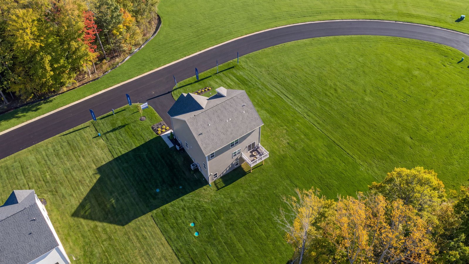 Outdoor living area overlooking a spacious homesite at a new single-family home in King George, VA.
