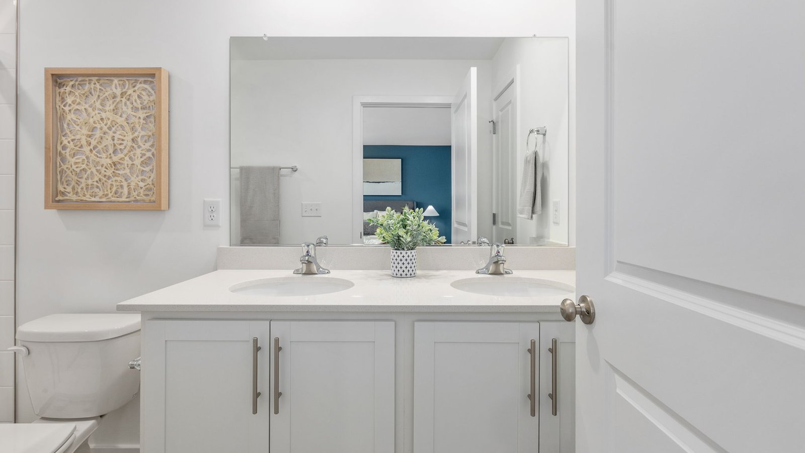primary bathroom dual sink vanity walk in shower