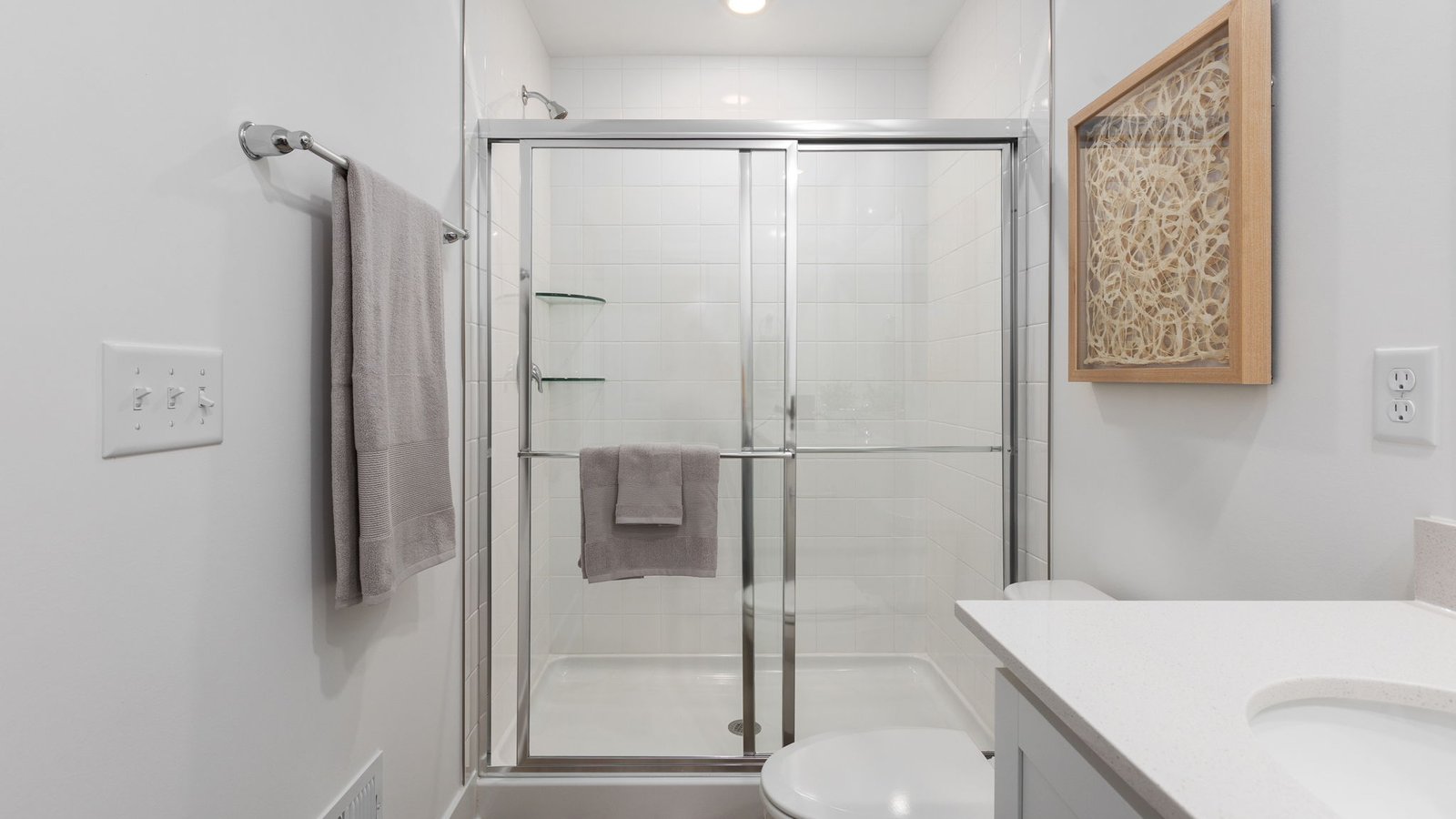 primary bathroom dual sink vanity walk in shower