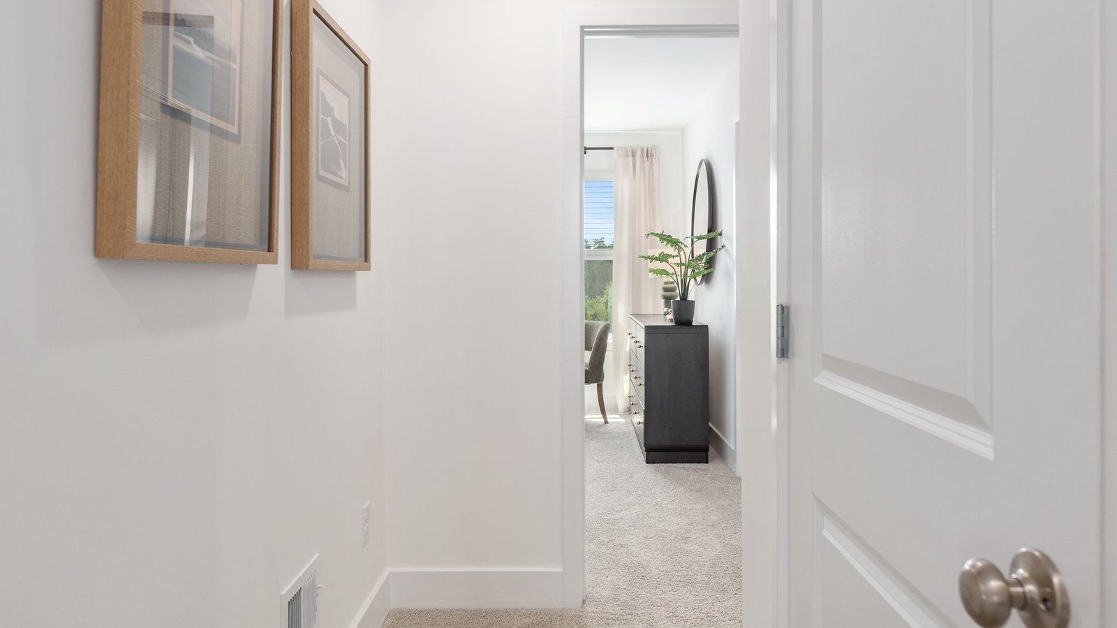 upstairs hallway with laundry room