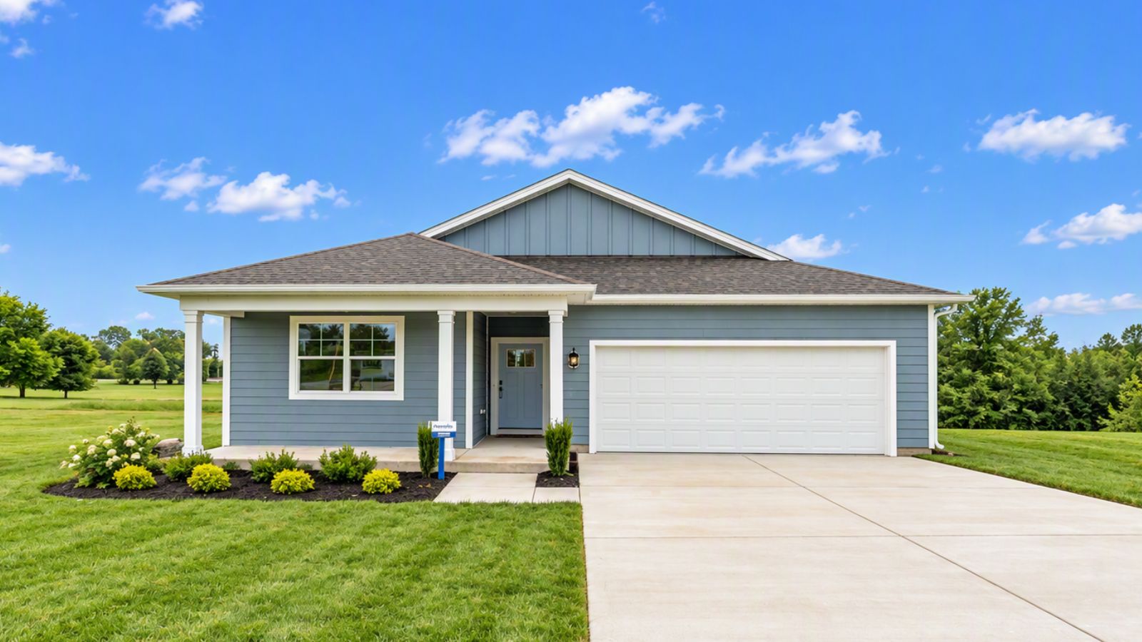 New construction home in Staunton VA featuring modern curb appeal, stone accents, covered front porch, and attached garage in the scenic Shenandoah Valley.