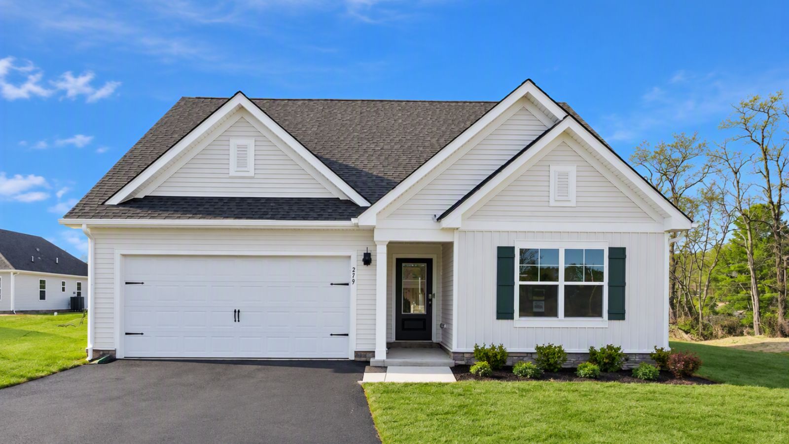 New construction single-family home in Waynesboro, VA featuring modern farmhouse architecture, spacious front porch, professional landscaping, and scenic Shenandoah Valley surroundings.