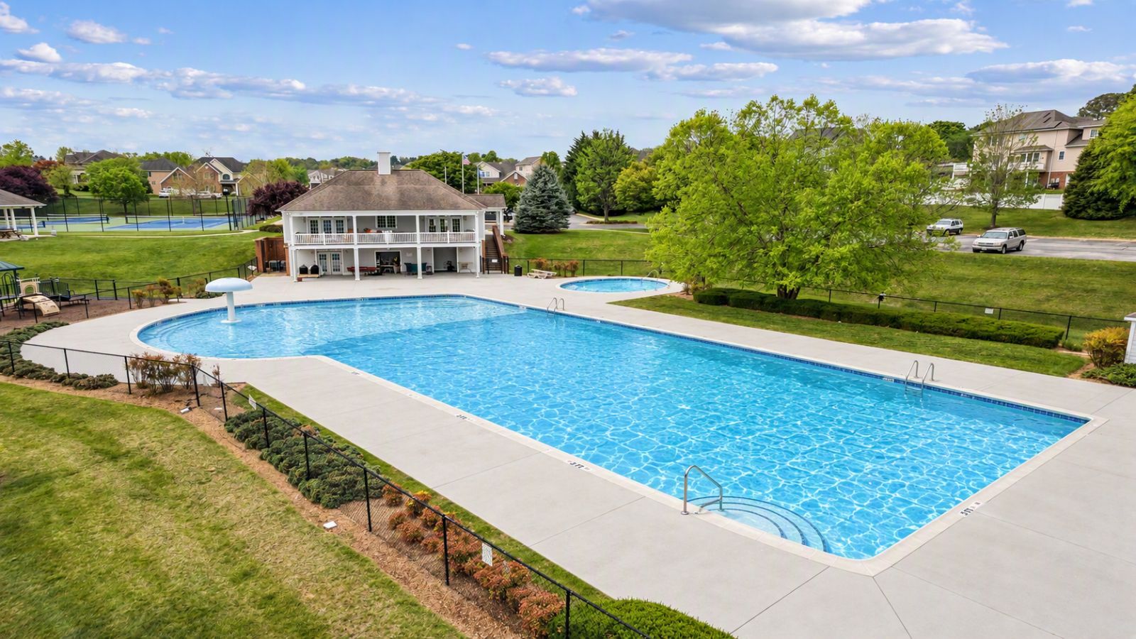 Resort-style community amenities in Staunton Virginia with covered pavilion, picnic tables, grilling stations, and scenic open spaces.