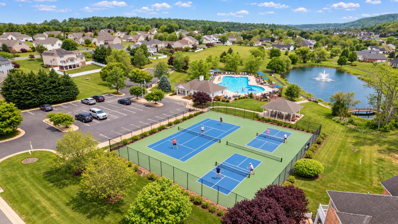 Resort-style community amenities in Staunton Virginia with covered pavilion, picnic tables, grilling stations, and scenic open spaces.