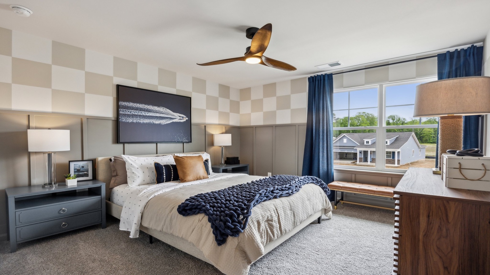 Secondary bedroom in Spring Lakes includes natural window light, closet with space, connectivity to upstairs