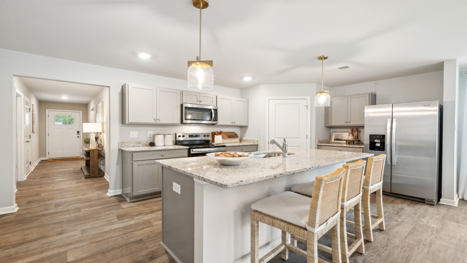 Spacious Kitchen island with seating, ideal daily living with prep zones, dining, and hosting in our fresh modern design