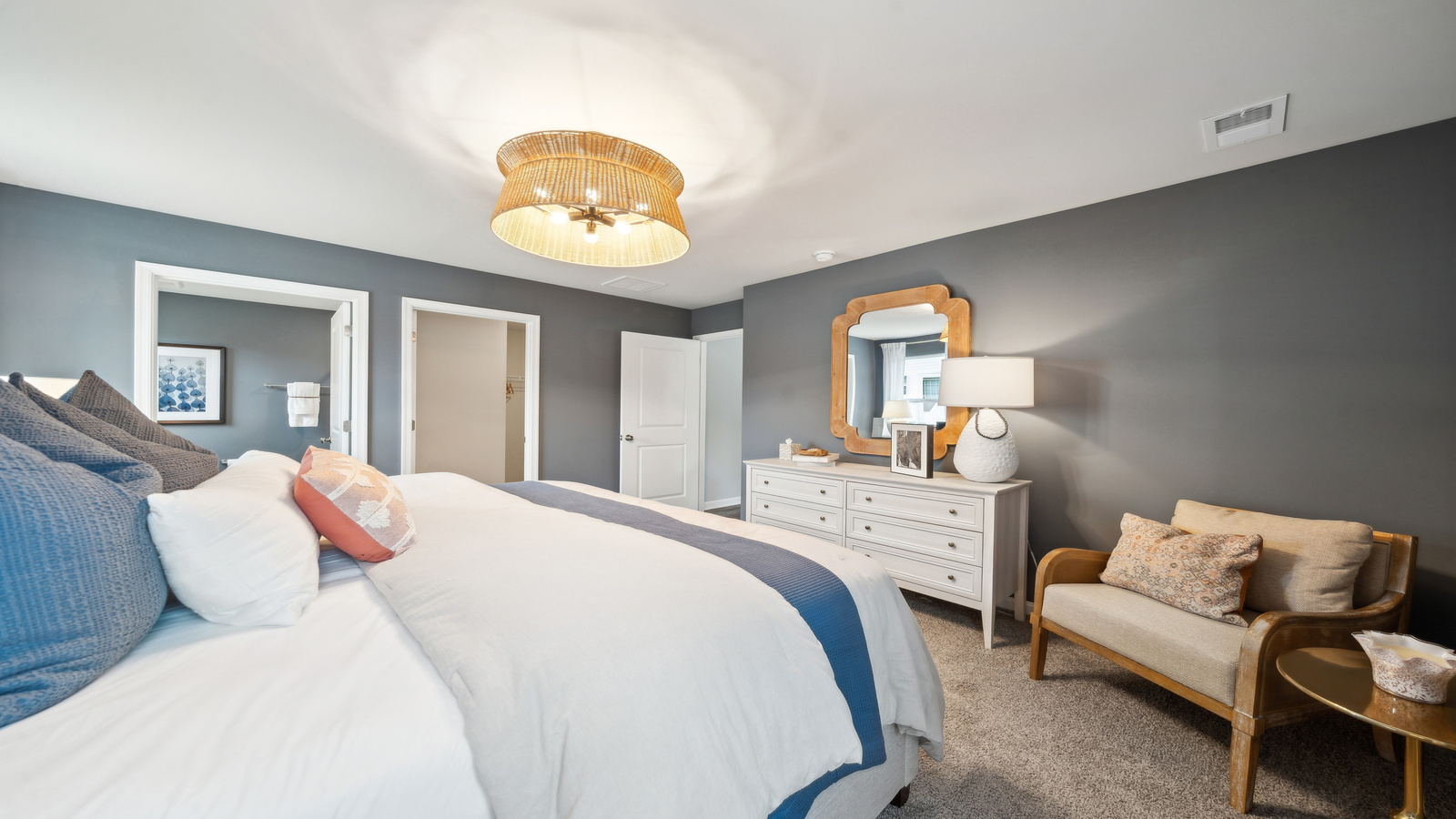 Owner’s suite offers natural window light, spa-inspired ensuite bathroom, backyard view, walk-in closet for everyday style