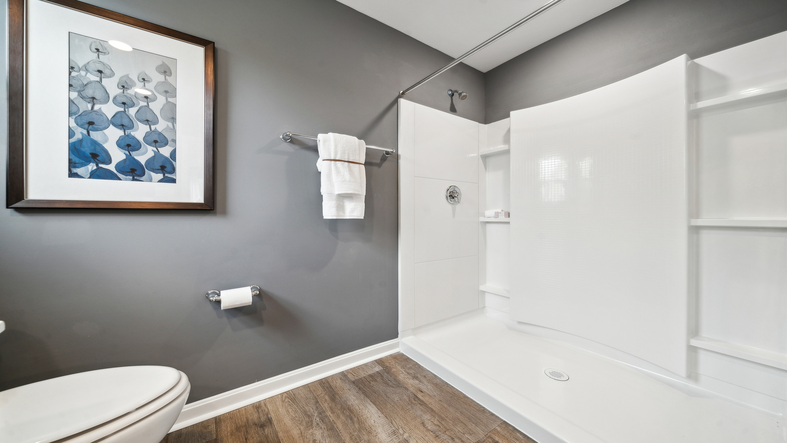 Owner’s ensuite in a new build home offers function with a walk-in closet, spa-like ensuite, stylish walk-in closet