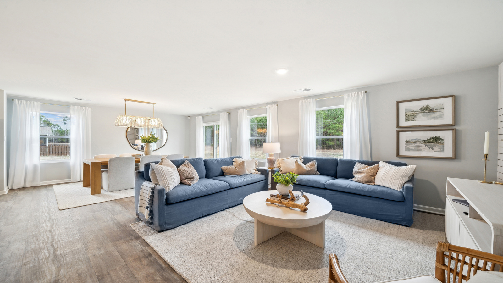 Living room features quality throughout, fresh open concept flow to the dining and outdoor areas, Eagle Ridge