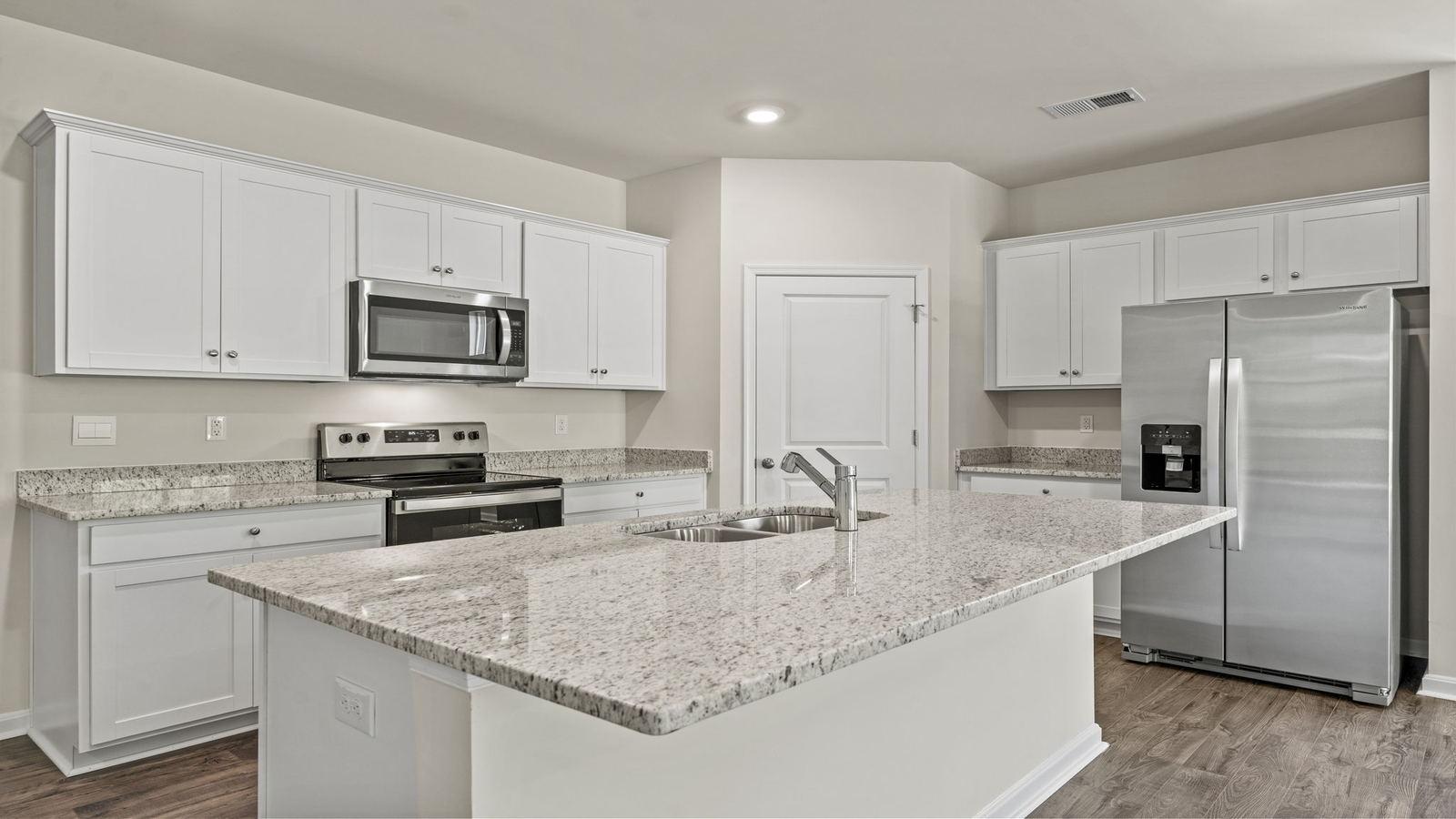 Spacious Kitchen island in this new home, ideal dining, daily prep zones, for entertaining and daily life in our stylish home