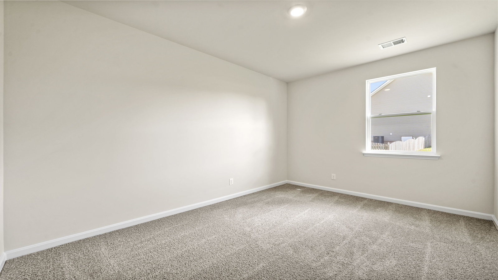 Primary bedroom designed for privacy and space with a convenient flow into spa-inspired ensuite bathroom and walk-in closet