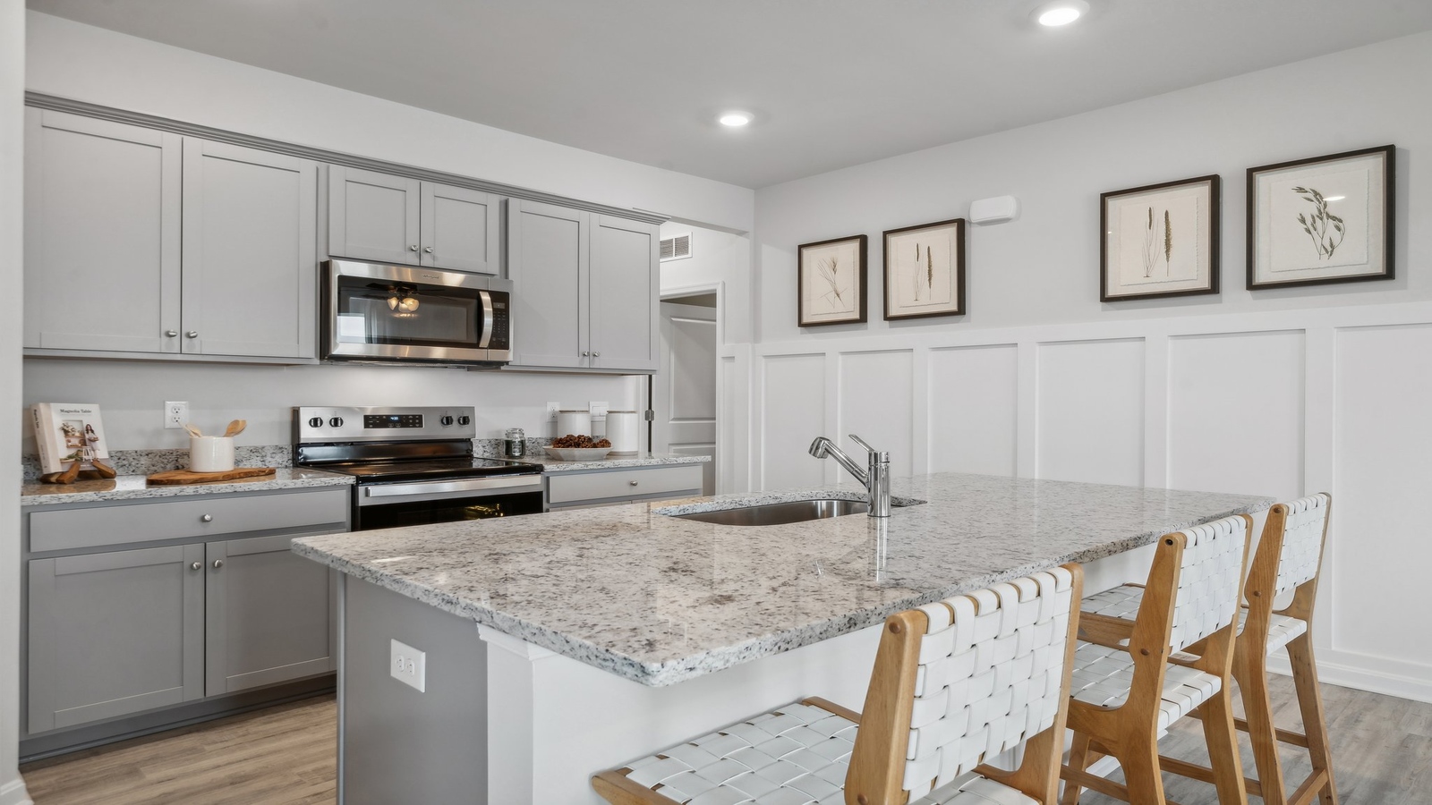 New home features a breakfast nook, adding a dining area tucked beside the kitchen with new appliance suite