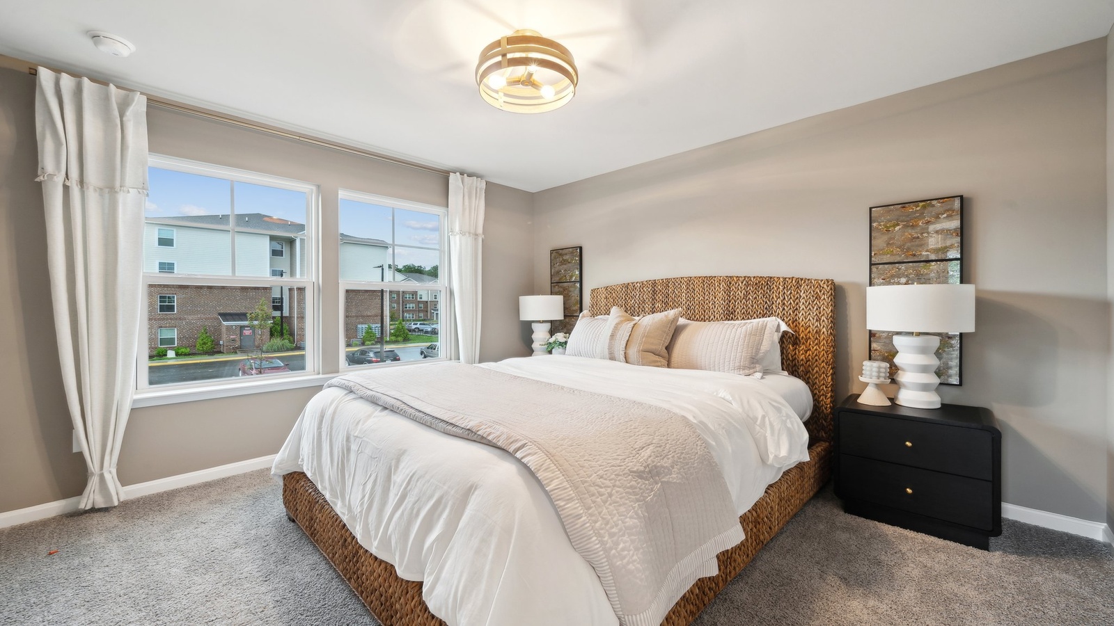 Secondary bedroom, flex-office, study, entertainment, and game room in this D.R. Horton new townhome