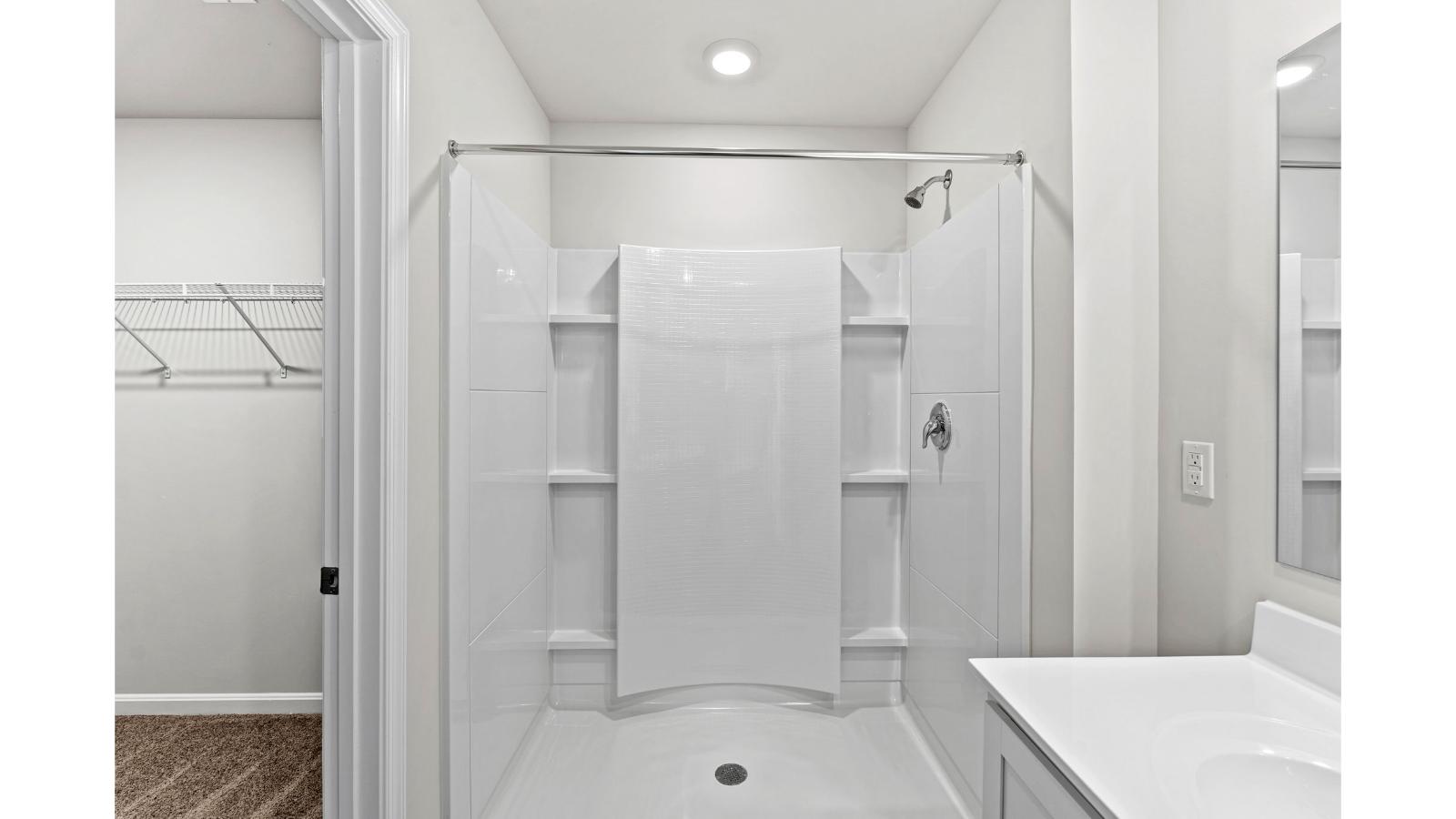 Owner's En-suite bath adds practical vanity space, spa-inspired design and access to the owner’s bedroom and Walk-in closet