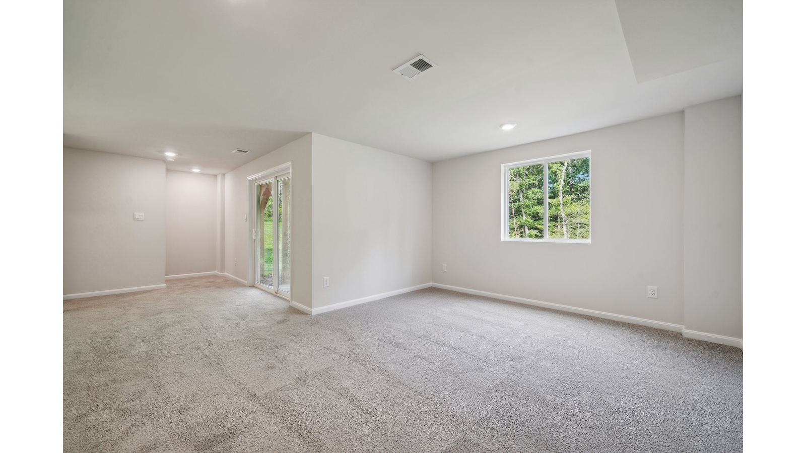 Primary en-suite bathroom in this D.R. Horton New Home featuring dual sinks, expansive vanity, shower-tub, Walk-in Closet